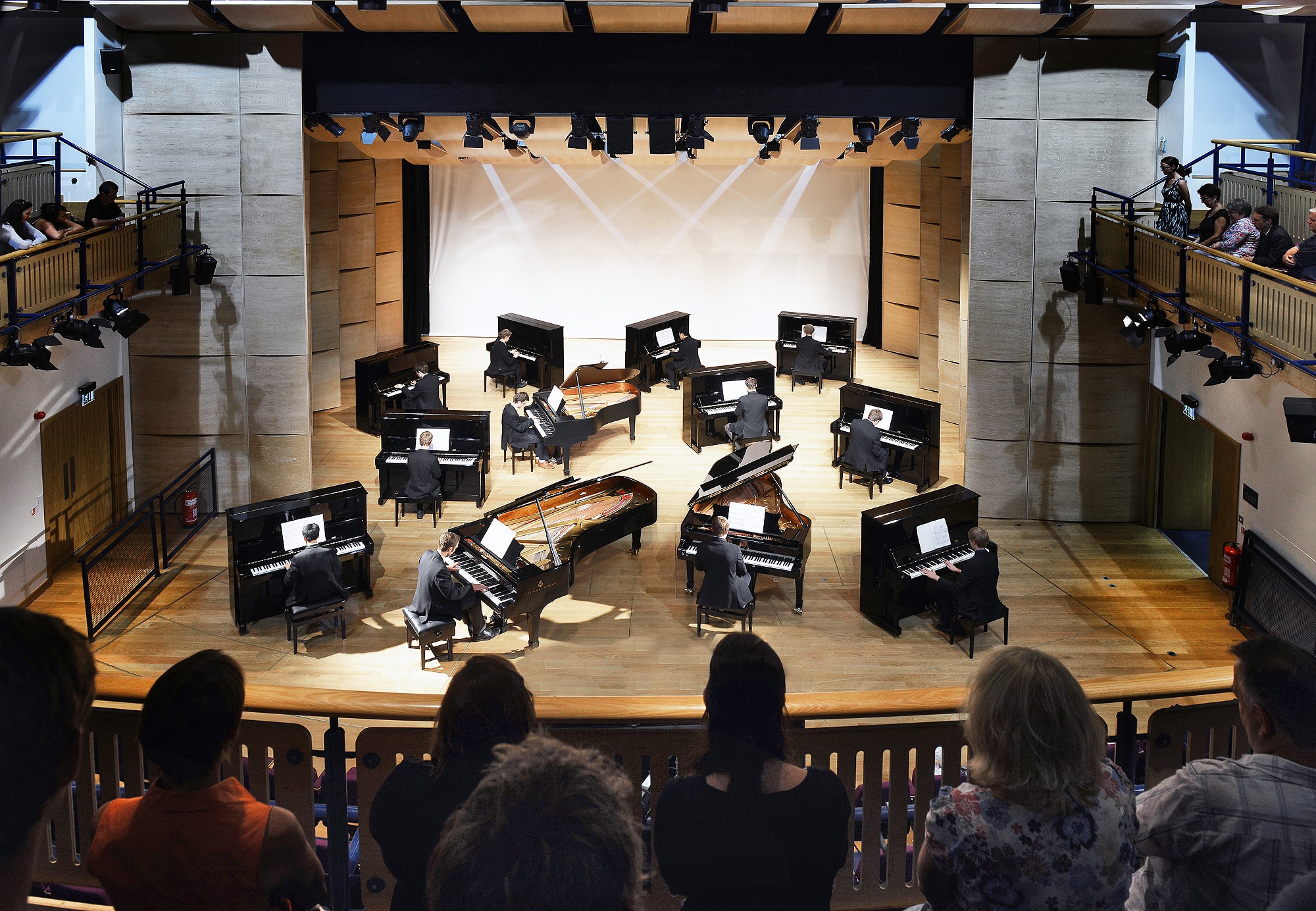 Hampton School Steinways - Internal wide of all the pianos in the 450 Hall-min